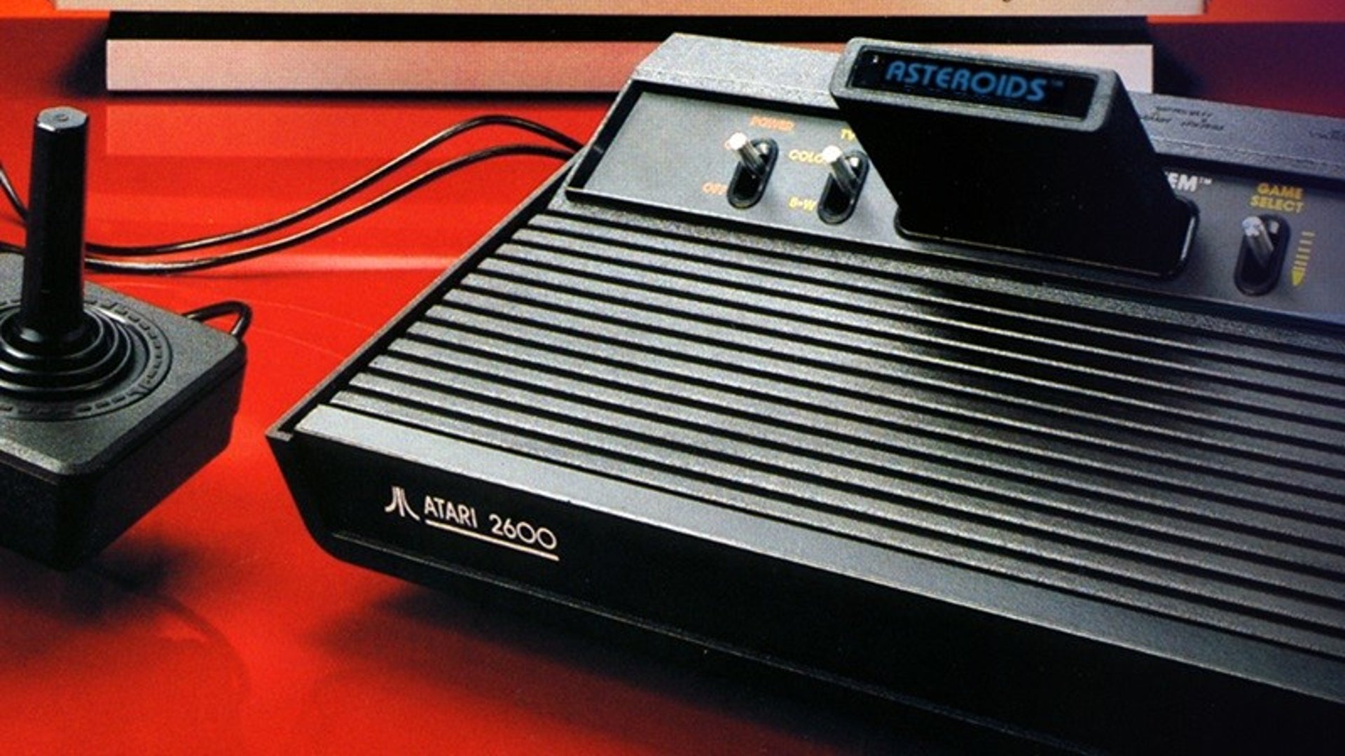 An Atari 2600 console with an Asteroids cart inserted in a screenshot from the Atari 50 collection - 1