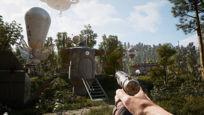 A screenshot from Atomic Heart which shows the player exploring the open world, holding a pistol up to a steely silo among the trees.