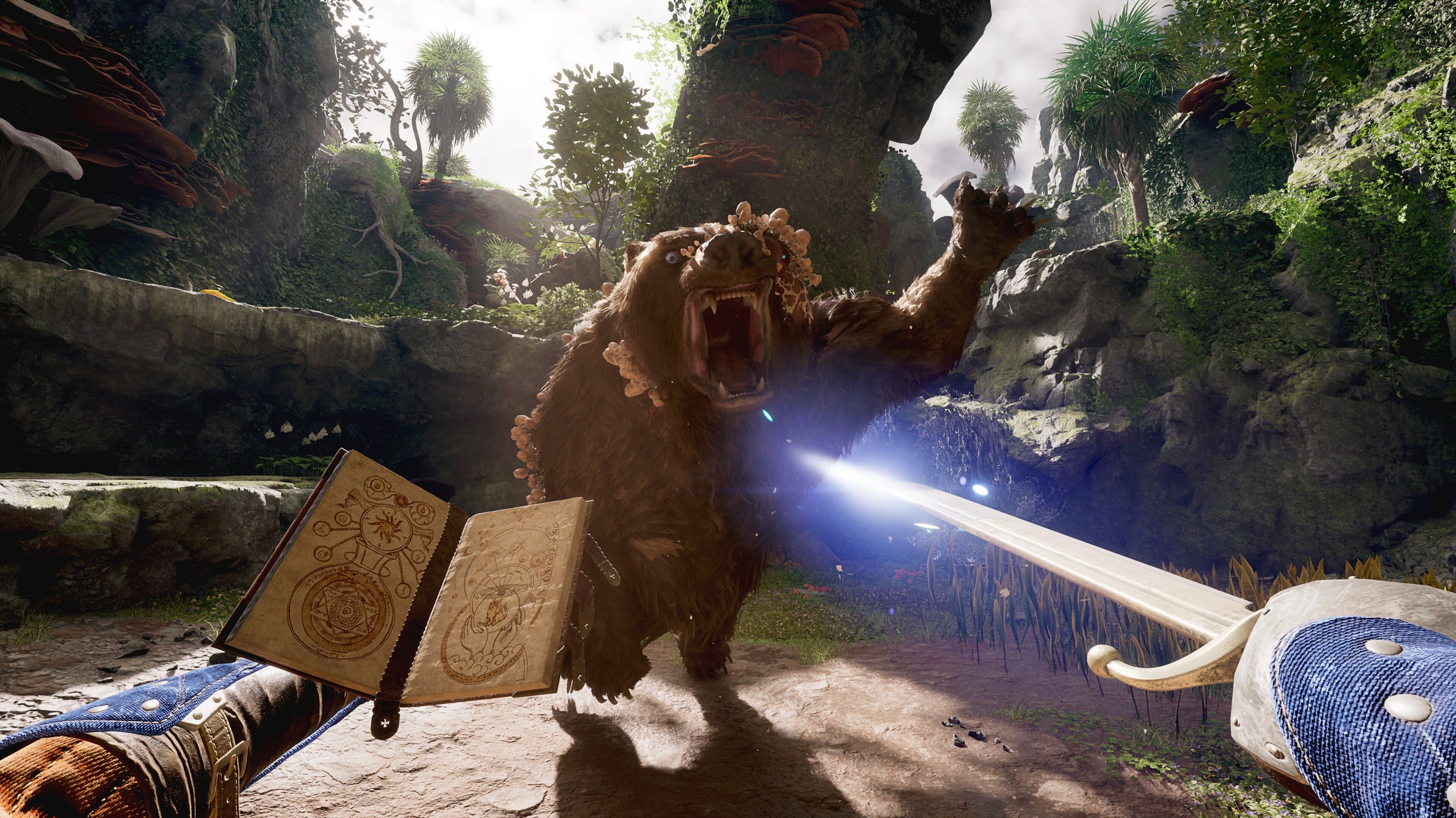 A bear with stuff growing out of its face attacking a player armed with a sword and magical grimoire in Obsidian's Avowed - 1