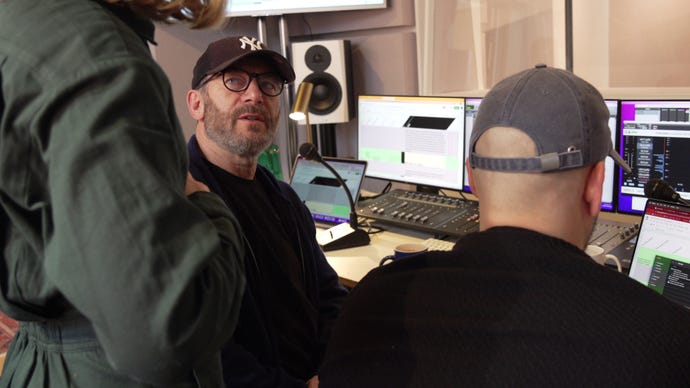 A photo of Jason Isaacs behind the scenes as he voices a Baldur’s Gate 3 character.