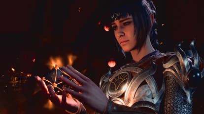 Shadowheart holds a glowing magical entity successful Baldur's Gate 3