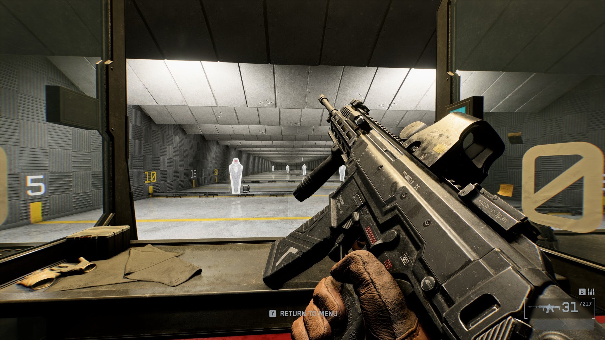 A close-up of the M433 assault rifle in Battlefield 6, with the gun tilted sideways by the player, angling towards the top left of the screen. In the background is a firing range. - 1