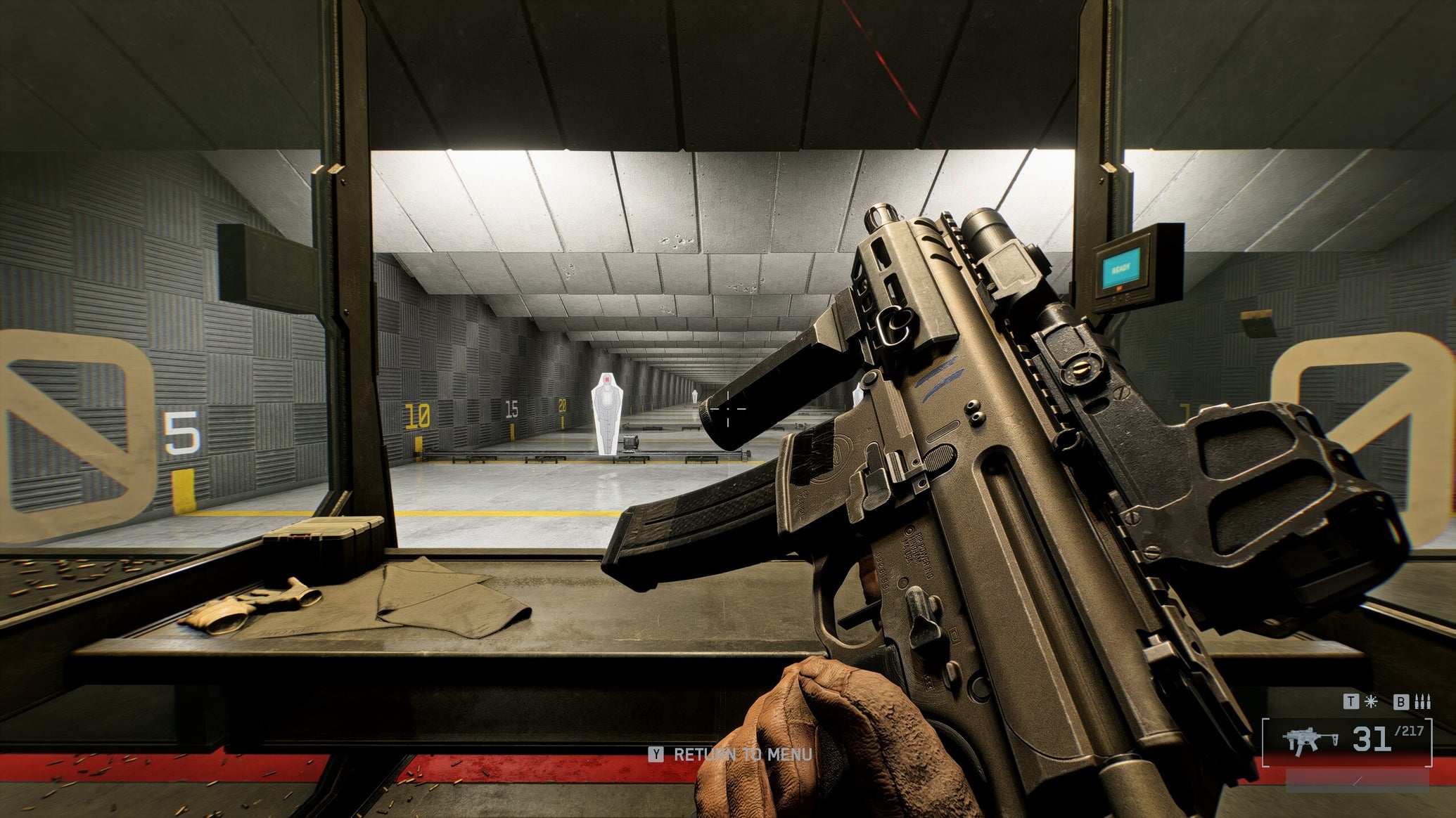 A close-up of the SGX SMG in Battlefield 6, with the gun tilted sideways by the player, angling towards the top left of the screen. In the background is a firing range. - 1