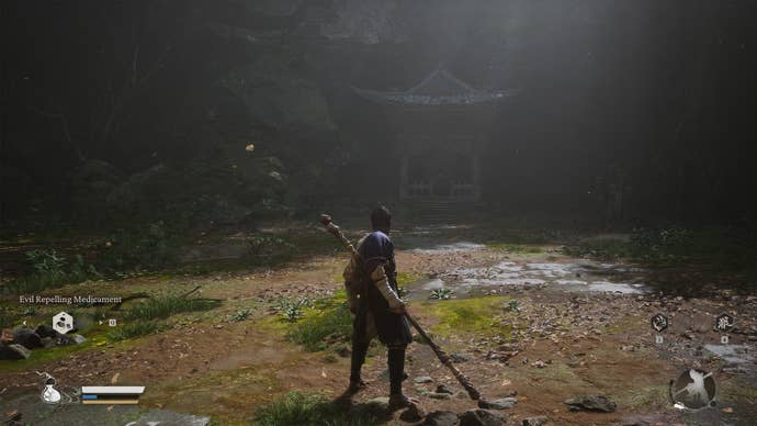 The protagonist looking at a large bell in Black Myth Wukong.