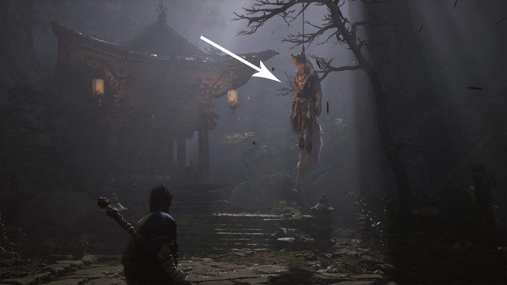 A wolf hanging from a tree in Black Myth Wukong. - 9