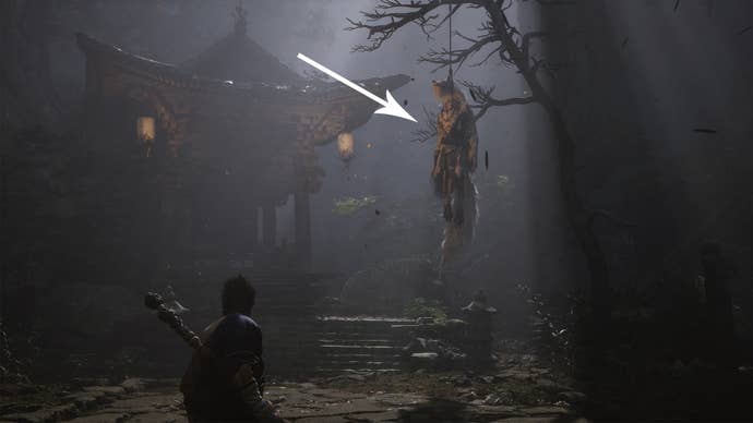 A wolf hanging from a tree in Black Myth Wukong.