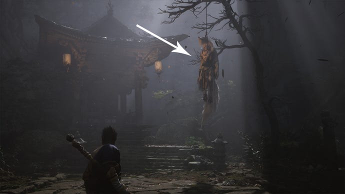 Un lobo colgado de un árbol en Black Myth Wukong.