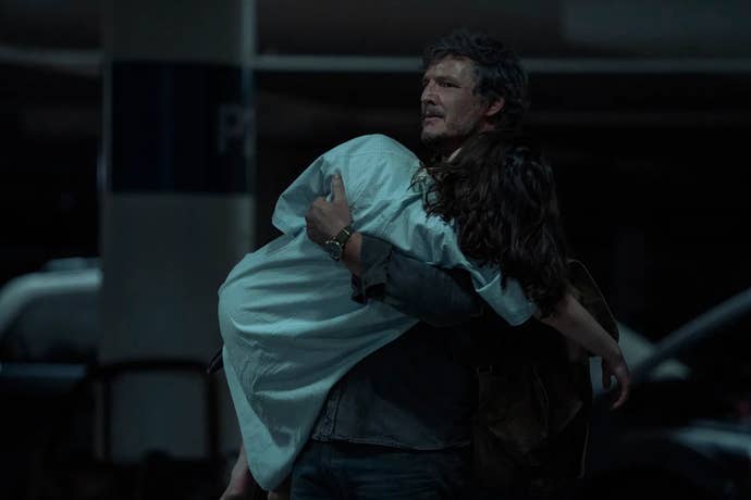 Pedro Pascal as Joel holds Bella Ramsey’s Ellie in the season one finale of The Last of Us