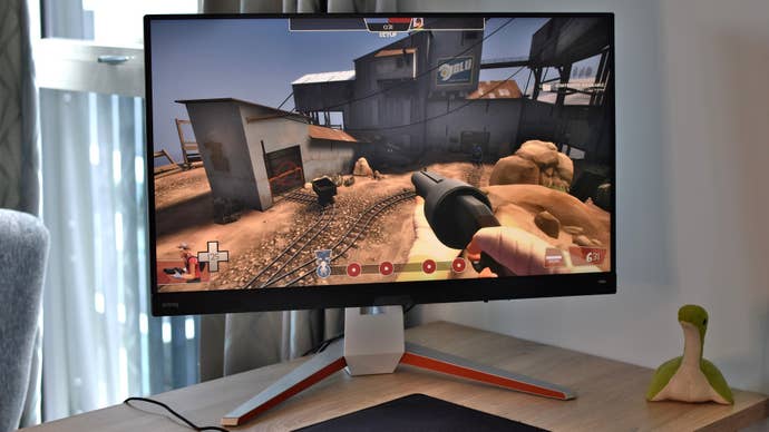 The BenQ Mobiuz EX3210U 4K gaming monitor, showing a scene from Team Fortress 2.