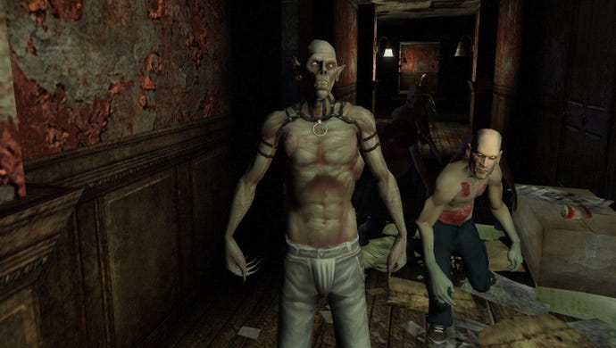 Two feral vampires approach the player in a run-down apartment building.