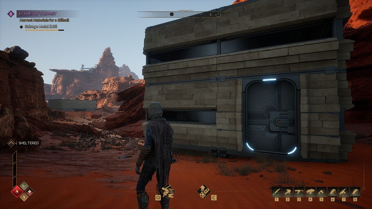 A view of several player-created bases in Dune: Awakening, each a boxy metal habitat in a canyon. - 3