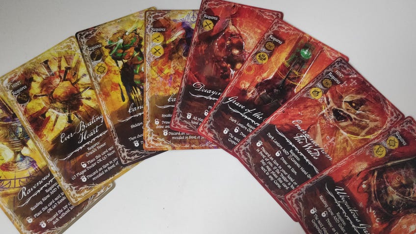An image of minor and major omen cards from Betrayal: Deck of Lost Souls.