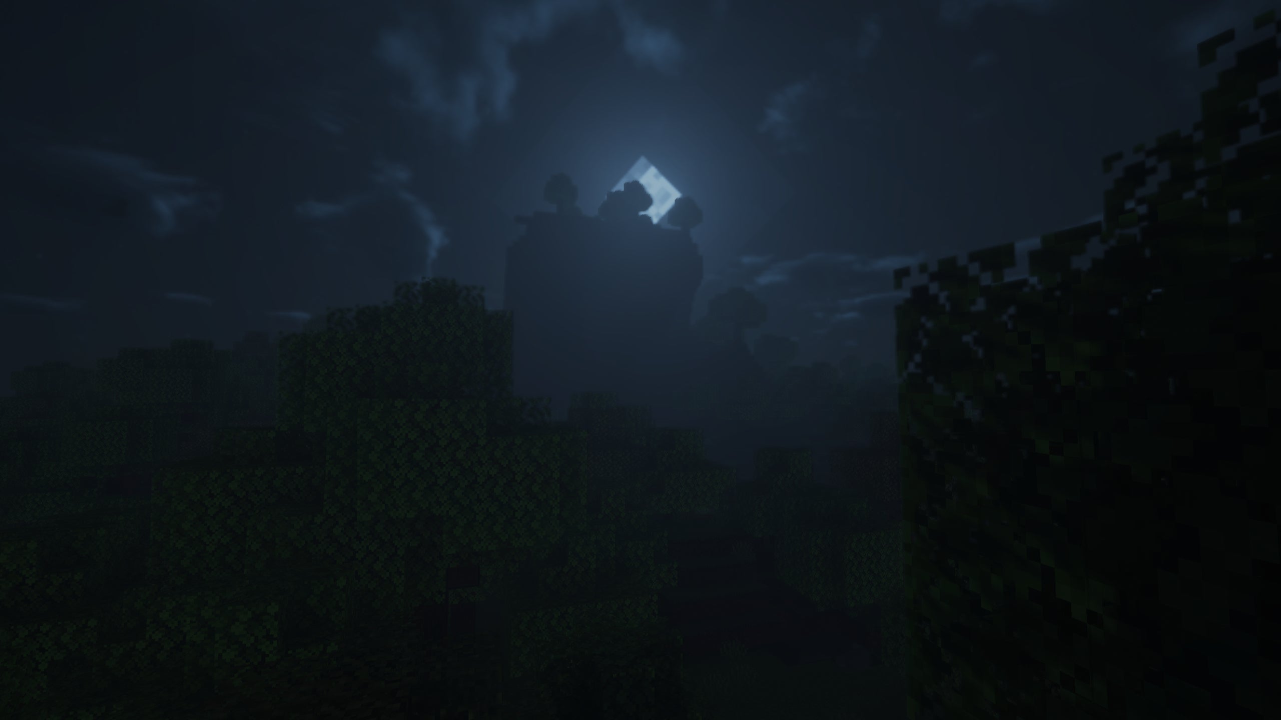 A nighttime scene in Minecraft, with the moon rising above the landscape showcasing Beyond Belief Shaders.