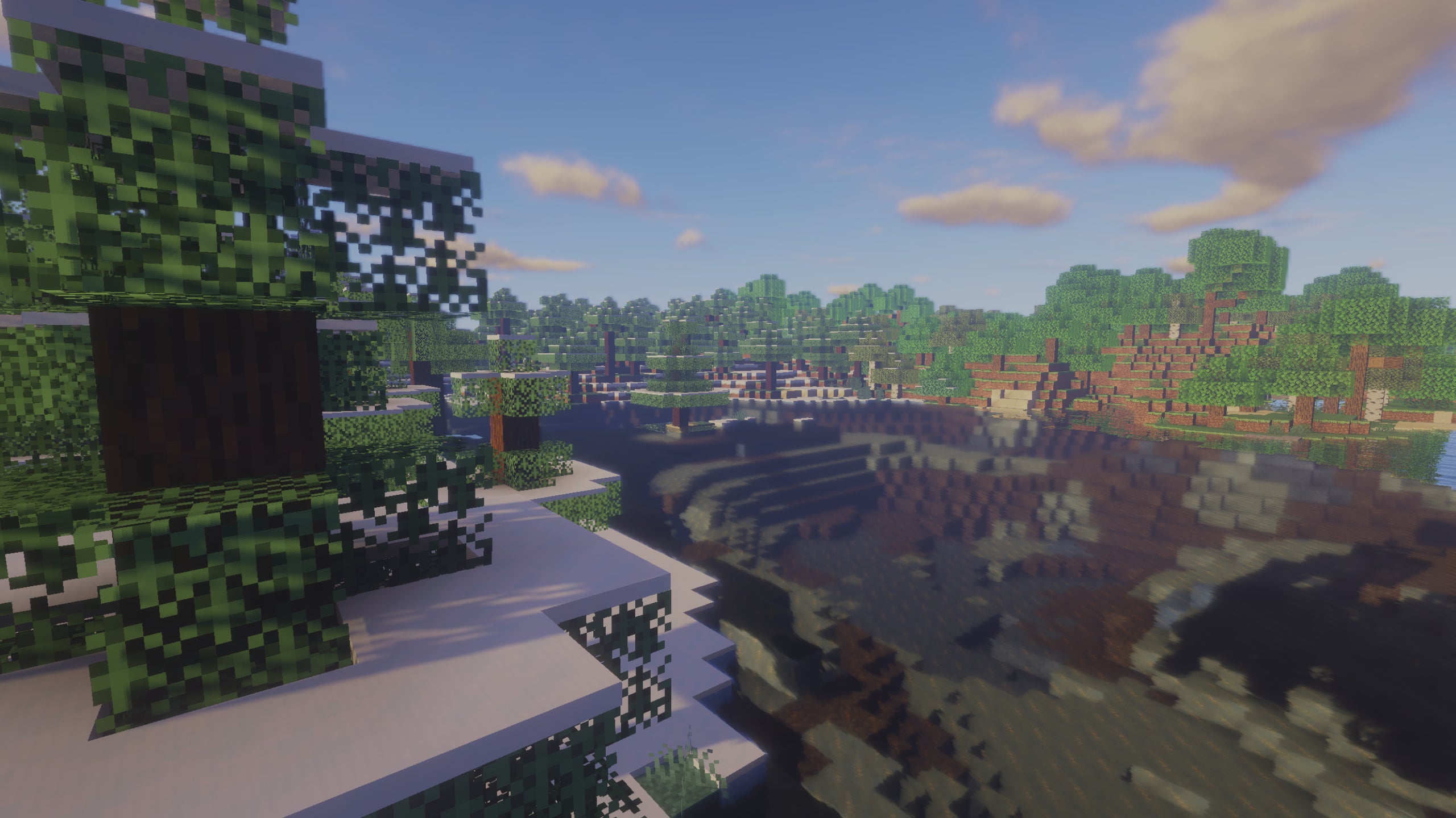 A forest next to a river in Minecraft showcasing Beyond Belief Shaders.