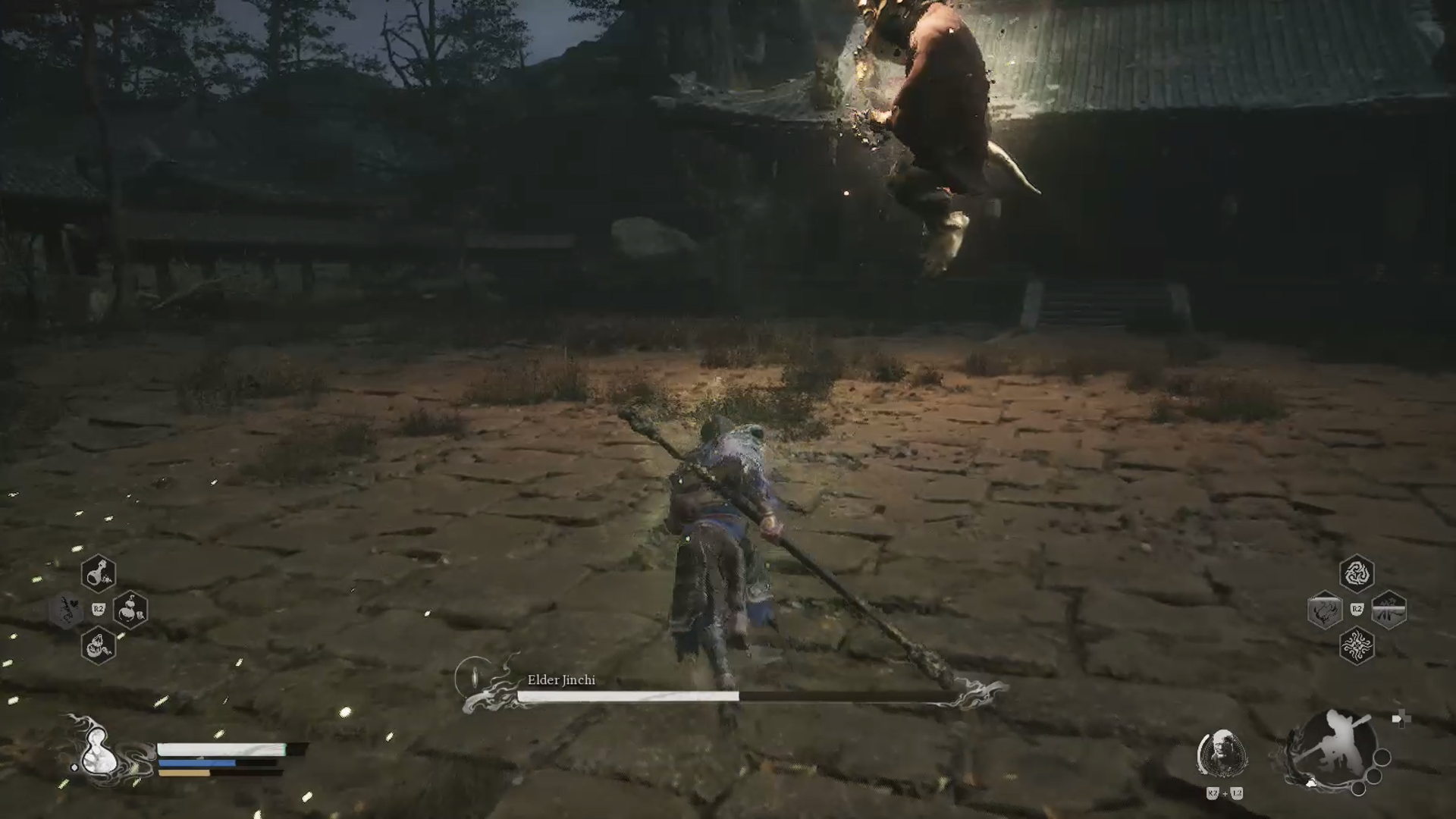 Elder Jinchi levitating in the air in the centre of the stage