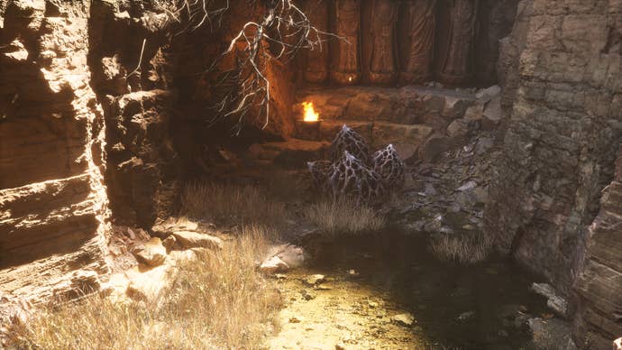 A screenshot of the Man-In-Stone, an NPC in Black Myth: Wukong.