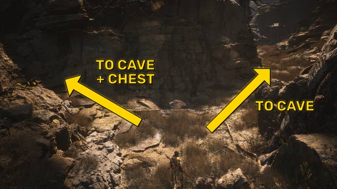 The player in Black Myth: Wukong approaches a fork in a path. Yellow arrows indicate that both paths lead to the same cave.