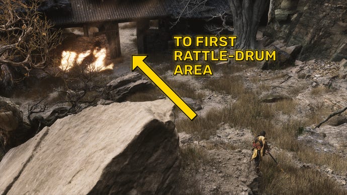 The player in Black Myth: Wukong follows the path towards the first area where the Old Rattle-Drum can be sounded.
