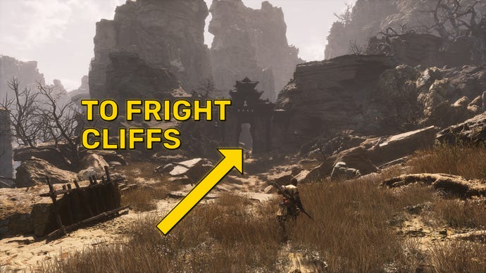The player in Black Myth: Wukong follows a yellow annotated arrow towards the Fright Cliffs region.
