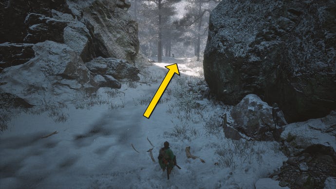 The player in Black Myth: Wukong runs along a path towards the Old Ginseng Guai boss in the snow-covered Valley Of Ecstasy.