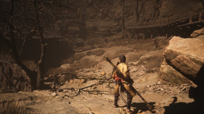 The player in Black Myth: Wukong follows the path towards the second area where the Old Rattle-Drum can be sounded.