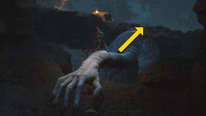 The player in Black Myth: Wukong heads along the path to the Yellow Loong boss in Chapter 4, while yellow arrows point the way down the path.