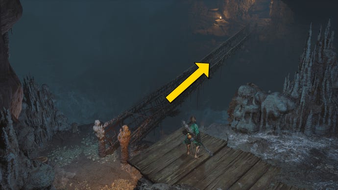 The player in Black Myth: Wukong heads along the path to the Yellow Loong boss in Chapter 4, while yellow arrows point the way down the path.