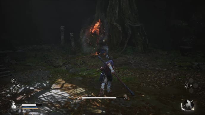 A monkey warrior prepares to dodge an attack from a spear-wielding wolf in Black Myth Wukong.