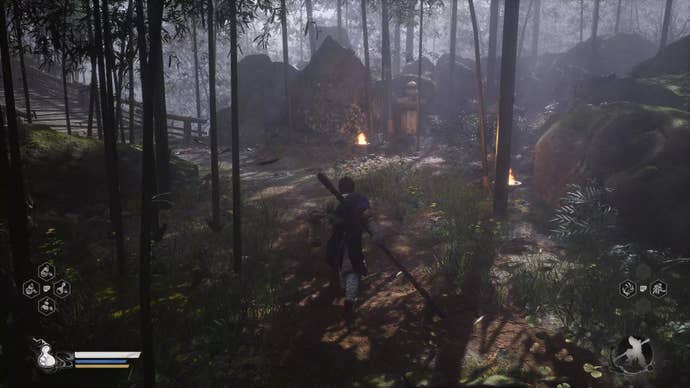 A monkey warrior ascends some stairs in a bamboo forest in Black Myth: Wukong.