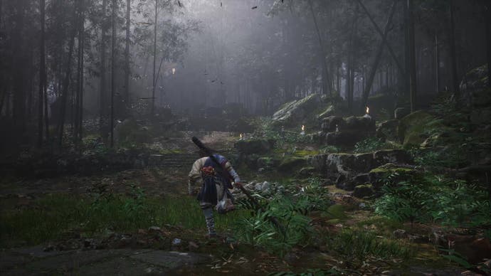 A monkey warrior heads up some steps inside a bamboo forest in Black Myth Wukong.