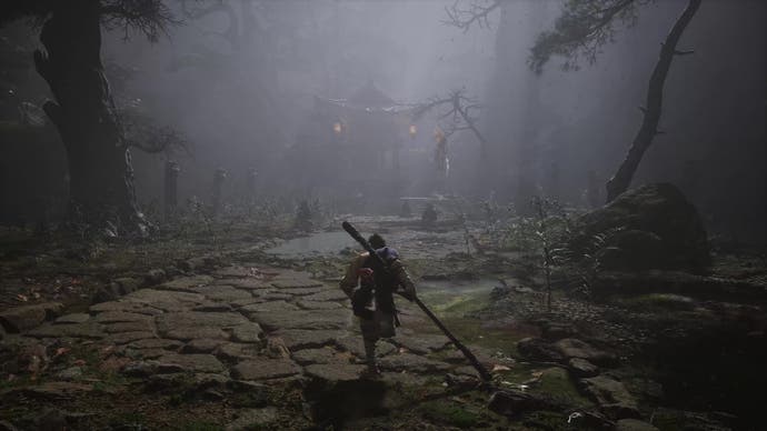 A monkey warrior approaches a bell in a misty forest in Black Myth Wukong.