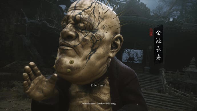 A large golden monk raises his hand in Black Myth Wukong.