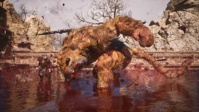 A tiger warrior bathes in a pool of blood in Black Myth: Wukong.