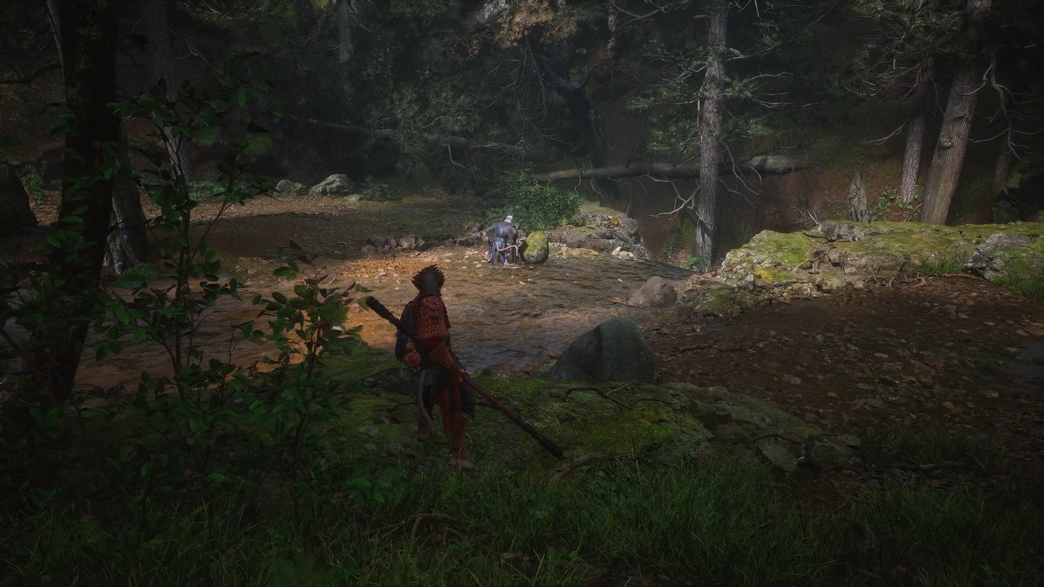 The player in Black Myth: Wukong approaches a Buddha head statue on the ground in Chapter 1, where a monkey is seen briefly before running away. - 4