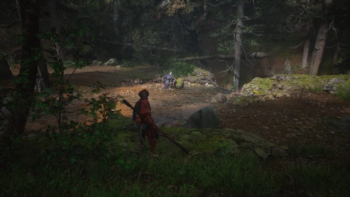 The player in Black Myth: Wukong approaches a Buddha head statue on the ground in Chapter 1, where a monkey is seen briefly before running away.