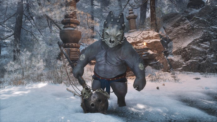 A Turtle Treasure enemy wielding a large club walks through the snow towards the camera in Chapter 3 of Black Myth: Wukong.