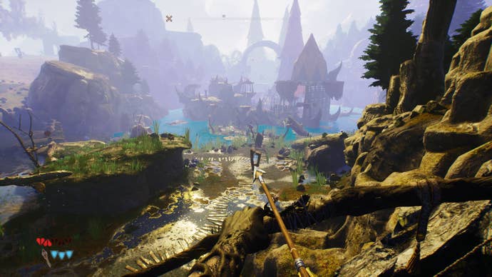 Looking out at a strange landscape in Blacktail, a rocky forest valley with a settlement in the distance