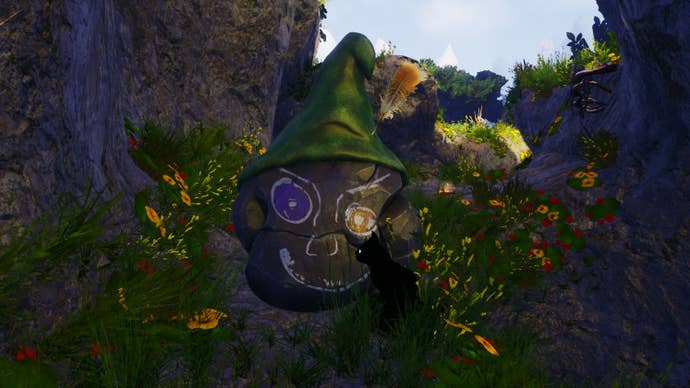 A big rock with a hat and a crudely painted face speaks to the player in Blacktail (via a cat)