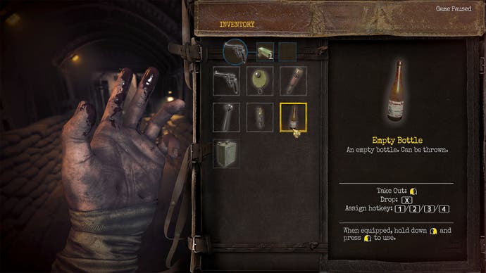 blood on someone's fingertips in Amnesia The Bunker, along with an inventory menu