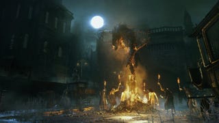 Villagers-turned-beasts in Bloodborne crowded round a fire.