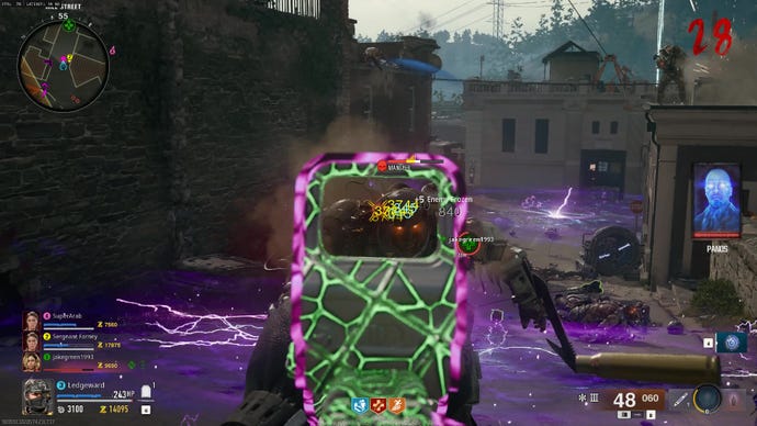 A pack-a-punched weapon is aimed at an armoured zombie.