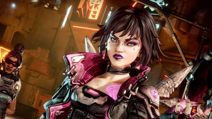 A Borderlands 4 trailer shot showing Vault Hunter Vex the Siren as she glowers at the camera.