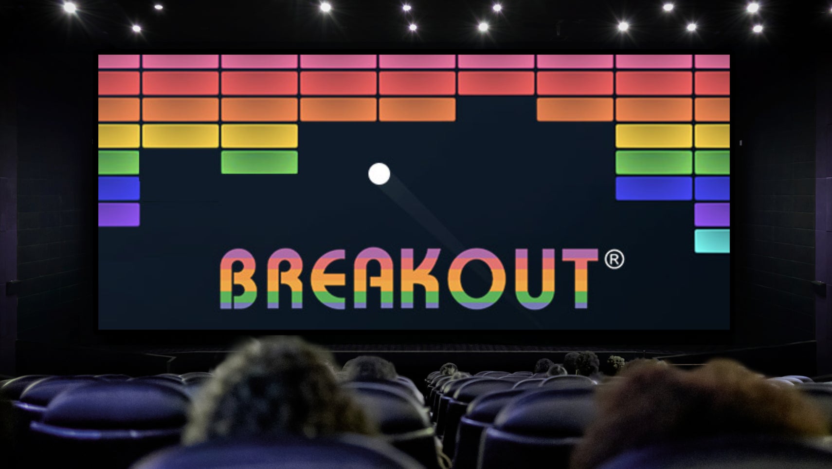 Composite image showing moviegoers in a darkened cinema watching a game of Breakout on the big screen.