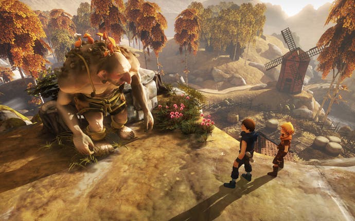 Screenshot from Brothers: A Tale of Two Sons showing the two simblings conversing with an ogre