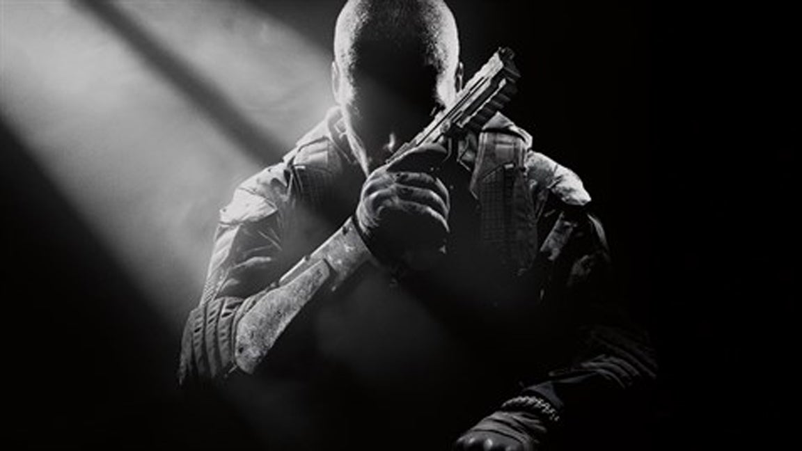 Artwork for Call of Duty Black Ops 2 showing the silhouette of a soldier holding a gun.
