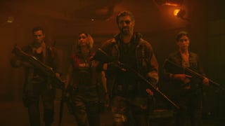 A Call of Duty: Black Ops 6 trailer image showing four Zombies mode protagonists walking through the red-lit corridors of a prison compound, guns in hands.