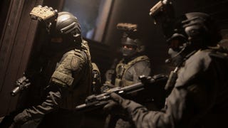 A Call of Duty: Modern Warfare screenshot showing three heavily armed and armoured soldiers.