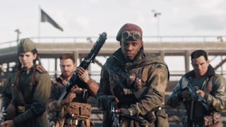 Call Of Duty: Vanguard - Four soldier with guns stand together holding guns.