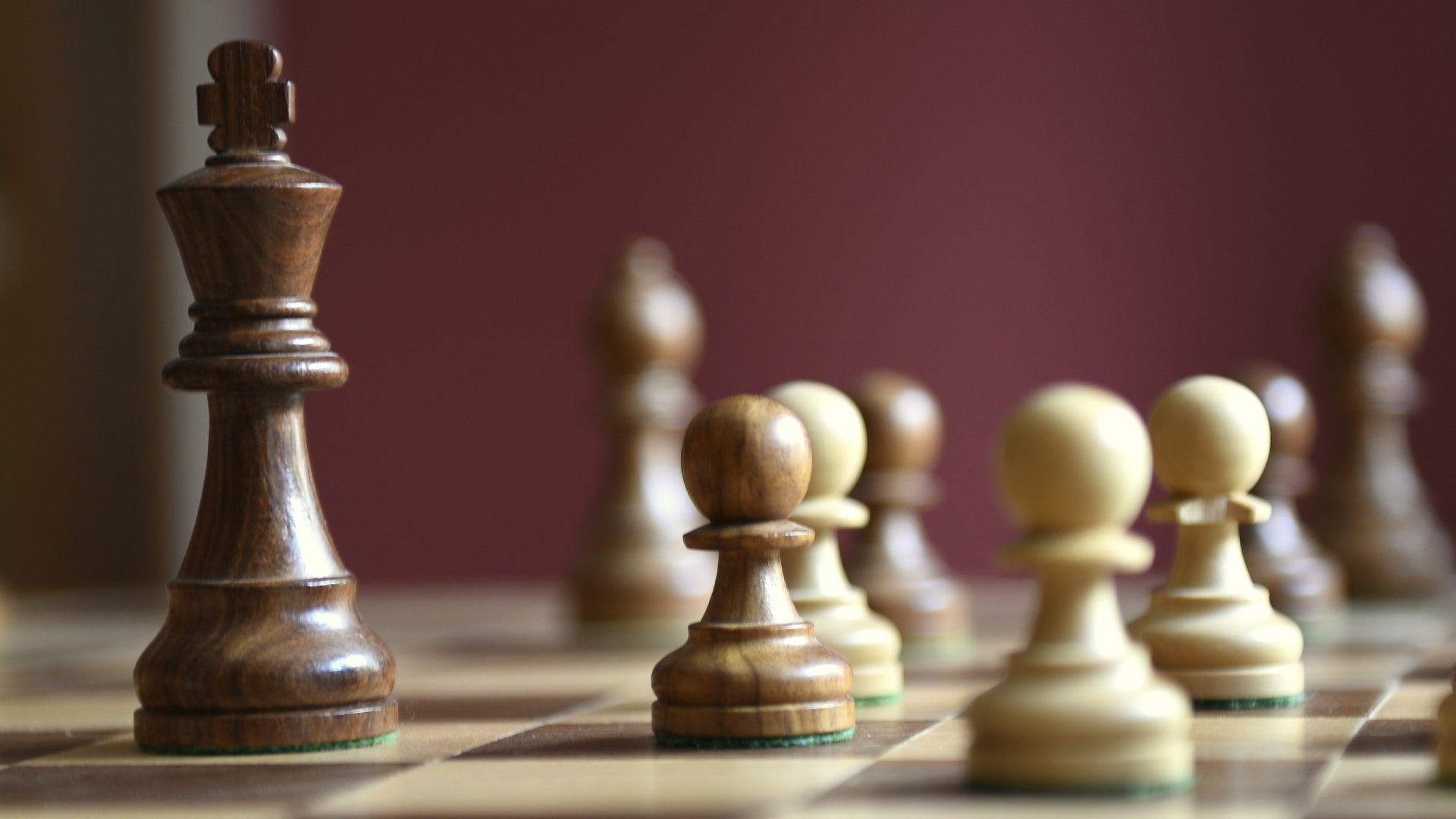 A chess king and pawn pieces