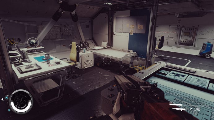 A captain's office in a spaceship in Starfield, with a desk and bed with ornaments.